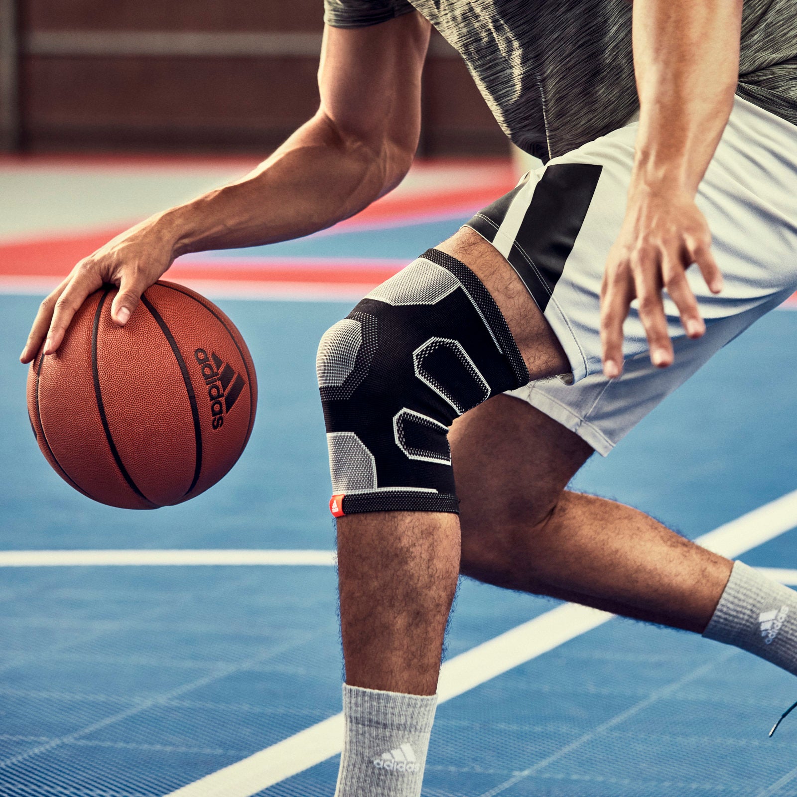 ADIDAS OPASKA STABILIZUJĄCA KOLANO XL ADSU-12524BK